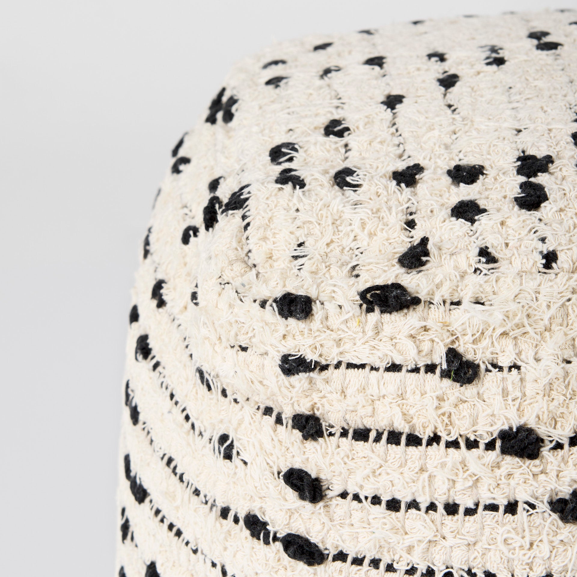 Aaohi Cream & Black Pouf